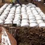 Residents Of Meru's Informal Settlements Use Sacks To Repair Roads