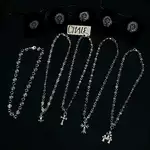 Bold American Personal Style With a chrome hearts necklace