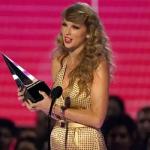 Swift Guitar, Eminem Shoes Among Items In Charity Auction