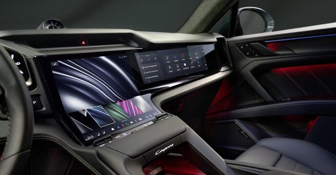 Porsche’s Electric Cayenne Debuts With A Bold Bent Screen