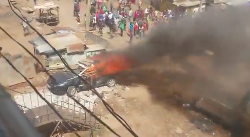 Police Car Burnt By Pro-Azimio Protestors In Kawangware