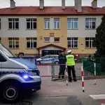 Poland’s police detain 76, check 50,000 schools after 2 attacks