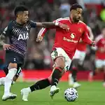 Ten-man Spurs rescue draw at Man Utd, Arsenal survive Leeds scare