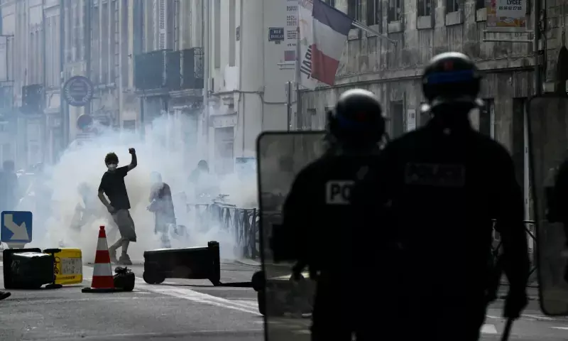Police fire teargas as French students, teachers, parents take to streets