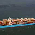 Cargo ship carrying over 2,500 containers sinks after reported naval mine explosion near Strait of Hormuz