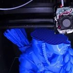 What does FDM stand for in 3D printing and how does it work?