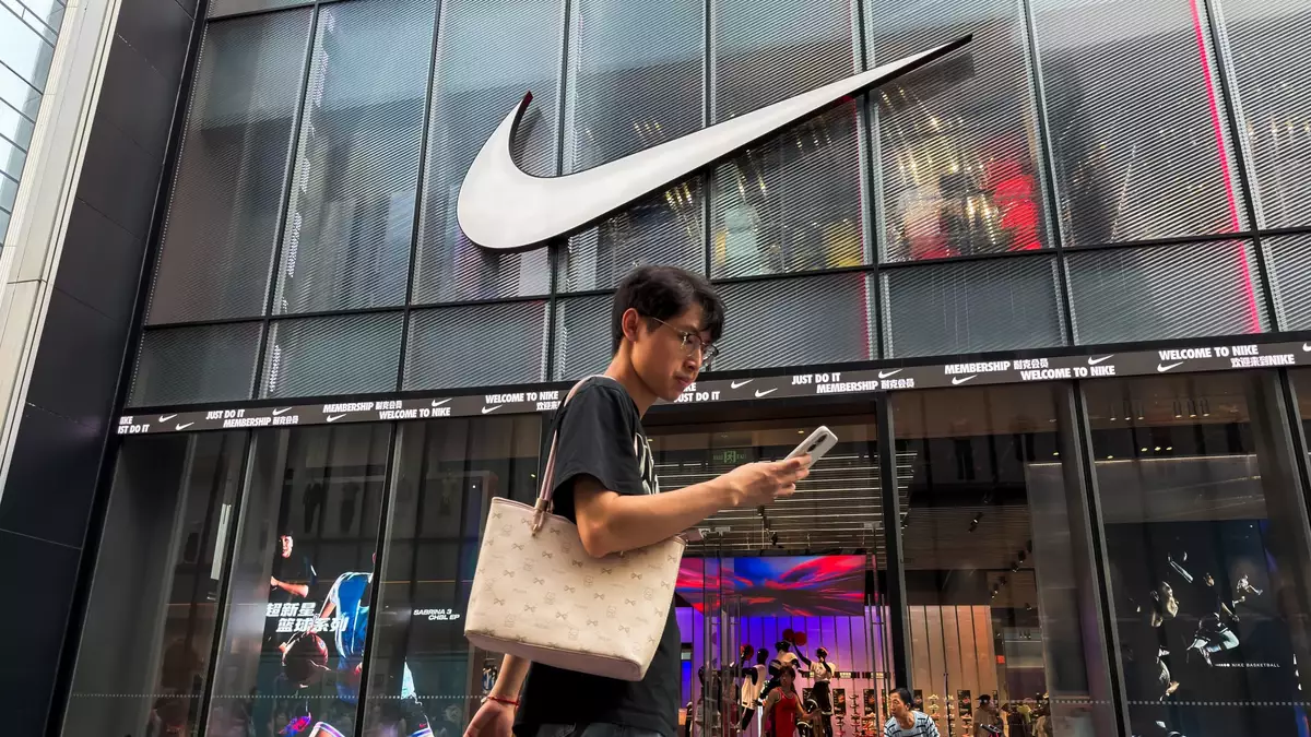 Nike shares tumble after weak revenue outlook and layoff plans underway 