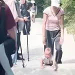 Viral video of 9-month-old Chinese baby climbing mountain steps sparks safety concerns