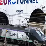 Bus hits train near Channel Tunnel in France, injuring 19