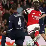 Arsenal cruise past Lille into share of Champions League lead