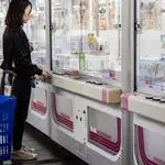 Inflation-squeezed Japanese flock to claw machines dangling everyday items