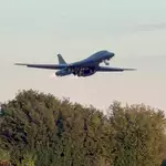 2 men charged in UK with helping Iran over air force base incident