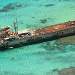 China says it allowed Philippines to resupply warship amid diplomatic tensions