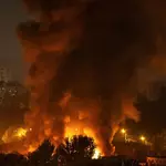 At least two killed in fire caused by 'massive strikes' on Kyiv