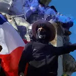 French protesters take to streets over rising prices, social strain