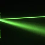 An experimental tour-de-force: Entanglement between glass bead and light