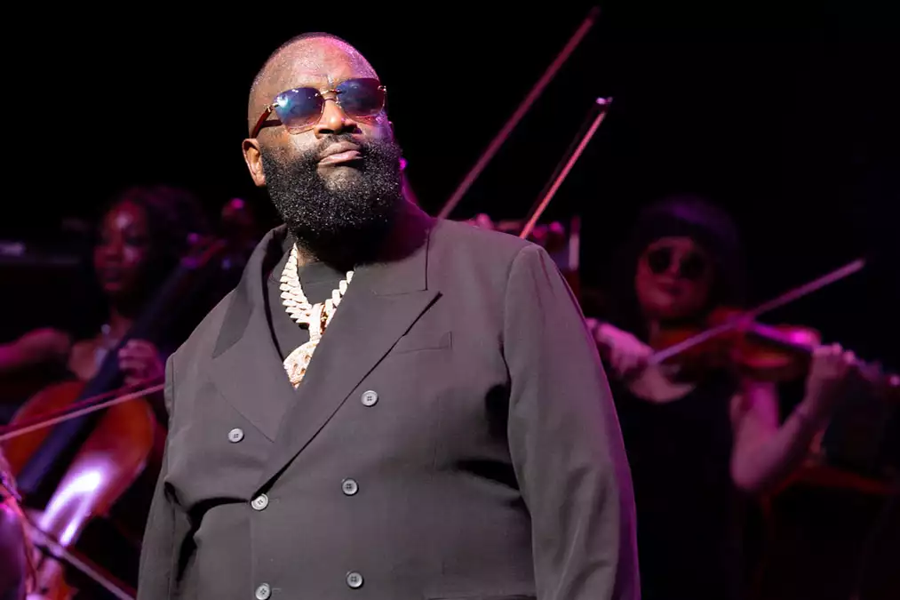 Rick Ross charged with battery after alleged attack on girlfriend