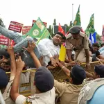 Indian opposition protest police action against lawmakers, push for poll chief's resignation