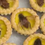 China eatery creates egg tarts topped with ‘giant cockroaches’, drawing widespread curiosity