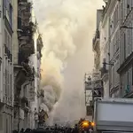Night of violence lingers over Paris as one Chinese cafe owner counts the costs of protest