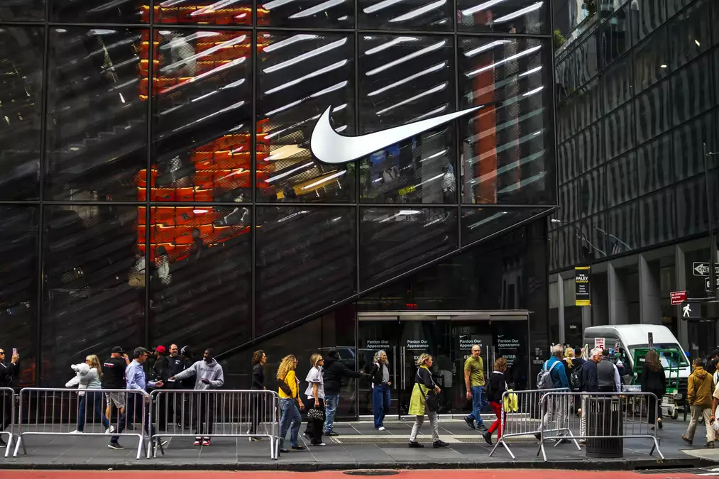 Nike shares drop as retailer posts disappointing sales, announces layoffs as part of restructuring