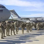 Iraqis celebrate the exit of US occupation forces after 23 years
