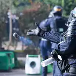 France halts use of stun grenades in policing of student protests
