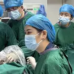 Chinese doctors remove lung tumour for baby still in mother’s womb, using needle