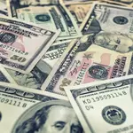 U.S. dollar climbs to 18-month high as bitcoin holds firm around $86,000