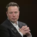 Tesla’s stock rises as Elon Musk drops new clues about a possible SpaceX merger