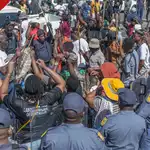 South Africa: 24 vehicles burnt, shops looted in anti-immigration protests