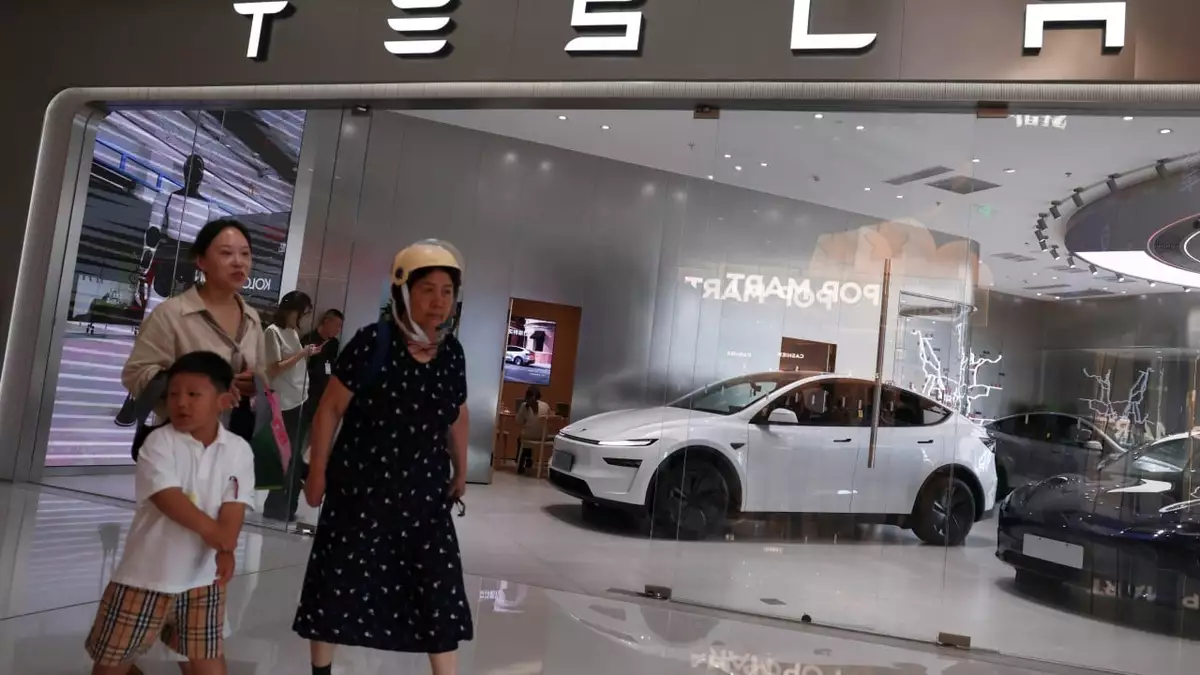 Tesla signs deal to integrate Alipay into its cars as China competition heats up