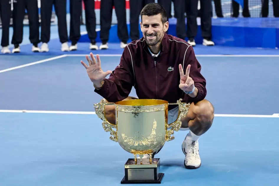 Djokovic wins China Open and keeps unbeaten record after de Minaur retires