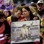 Tens of thousands march in Madrid to mourn pensioner whose eviction sparked housing protests