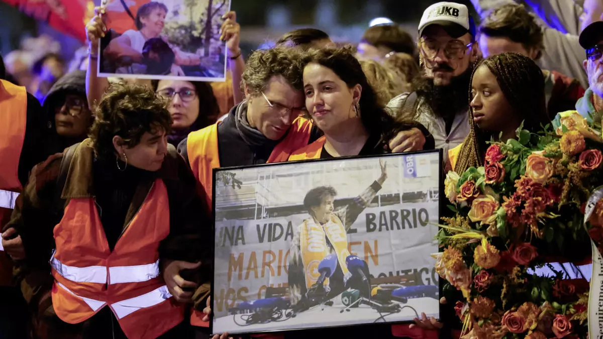 Tens of thousands march in Madrid to mourn pensioner whose eviction sparked housing protests
