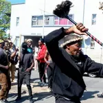 South Africa backtracks on asylum directive after violent anti-migrant riots leave 24 vehicles torched and foreign shops looted across major cities