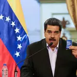Venezuela's Maduro, wife hit with new US torture charges