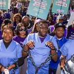 UK migrants in Liverpool protest 15-year permanent residence plan by singing Nigerian singer Asa’s ‘Jailer’