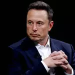 Musk back in the spotlight, but politics dims the awe