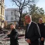 Russia strikes Kyiv bridge as Germany’s Merz visits, pledges aid