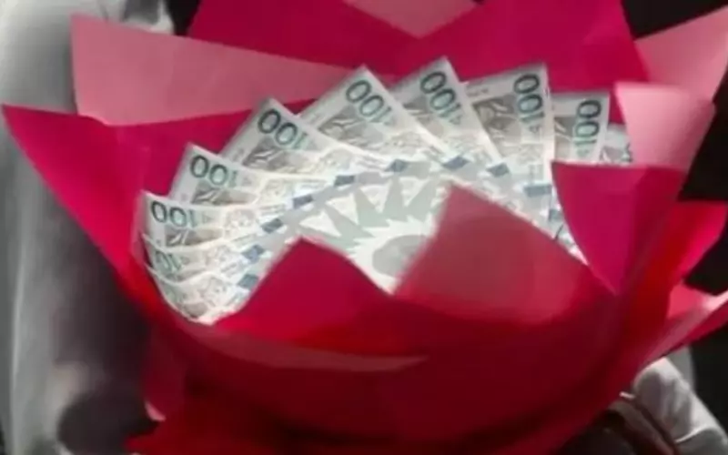 Ghana arrests seven women over money bouquets and money cakes