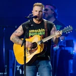 
				Zach Bryan Wears 'Free Palestine' Shirt Weeks After Macklemore Controversy
			