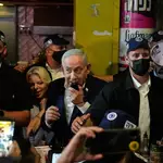 Netanyahu touts Trump endorsement on eve of vote, suggests they may restart war on Iran