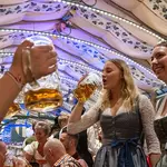 The ladies of Oktoberfest crush draft beers as fall heats up, Ryan Day's message to sick kids & a Strip fight